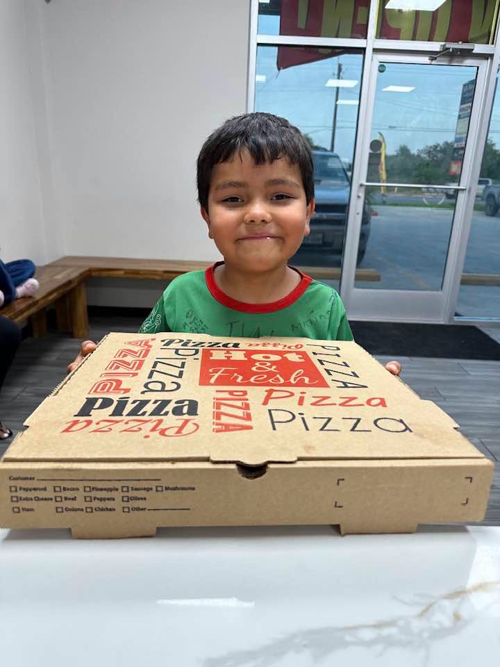 🍕 One of our very first loyal customers stopped by yesterday to pick up his fresh pizza!